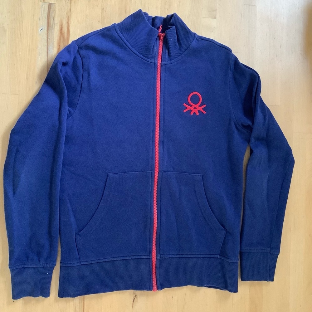 Benetton royal blue jacket with red logo and zipper 10 to 11 years